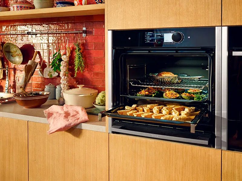 Neff oven with open door in creative kitchen