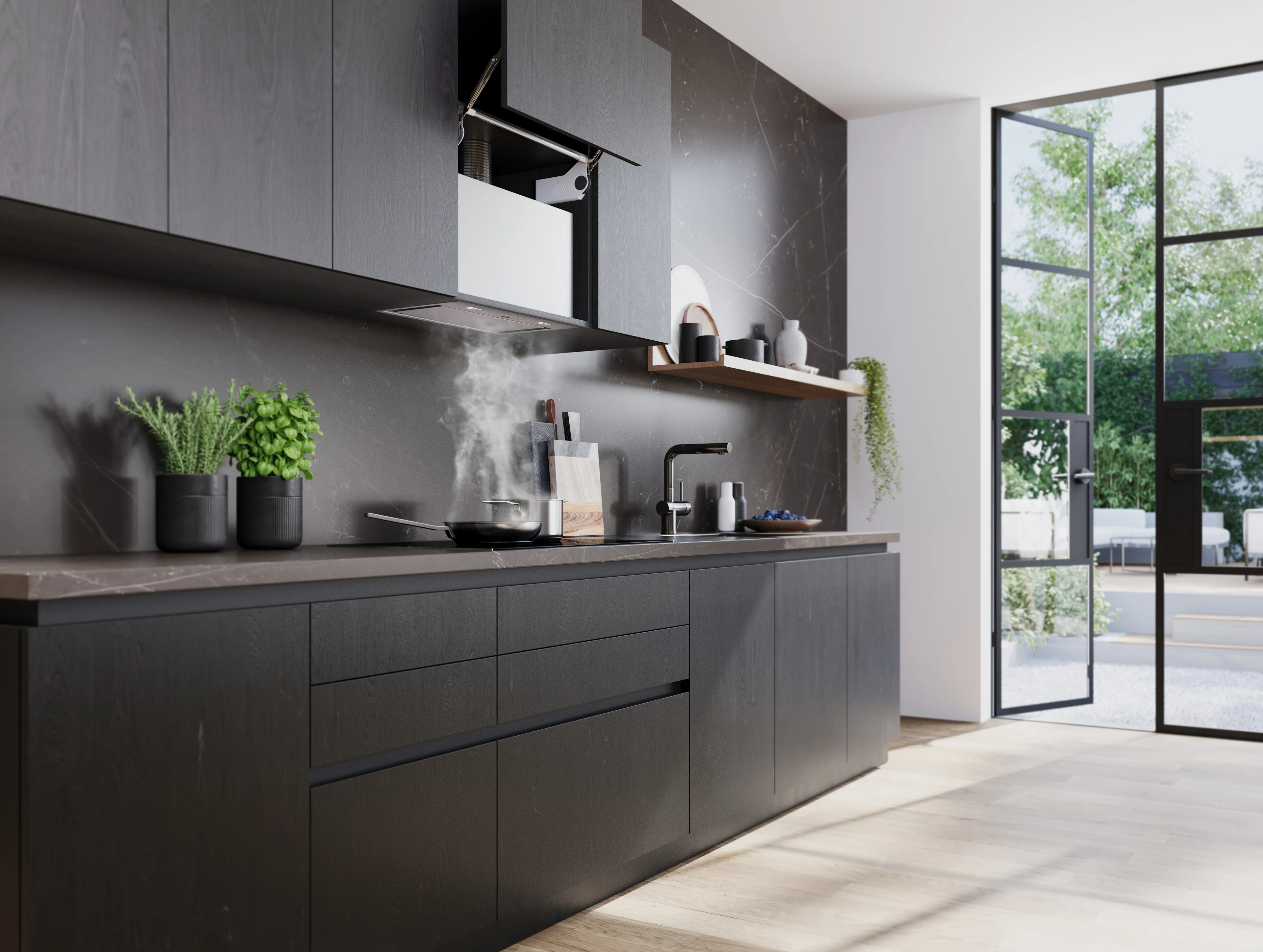 Modern kitchen hood with stainless steel and glass design, mounted under wood cabinetry, emitting steam from cooking below.