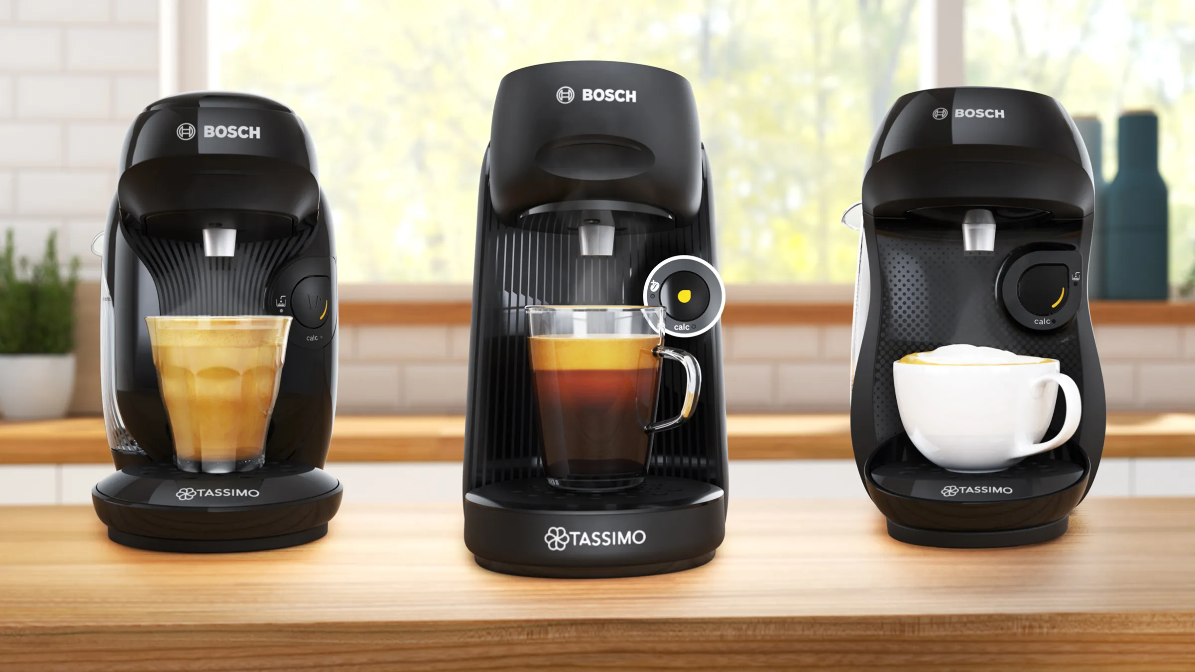 Aparat de cafea TASSIMO STYLE friendly pe un blat de bucătărie, cu o ceașcă de cafea umplută.
