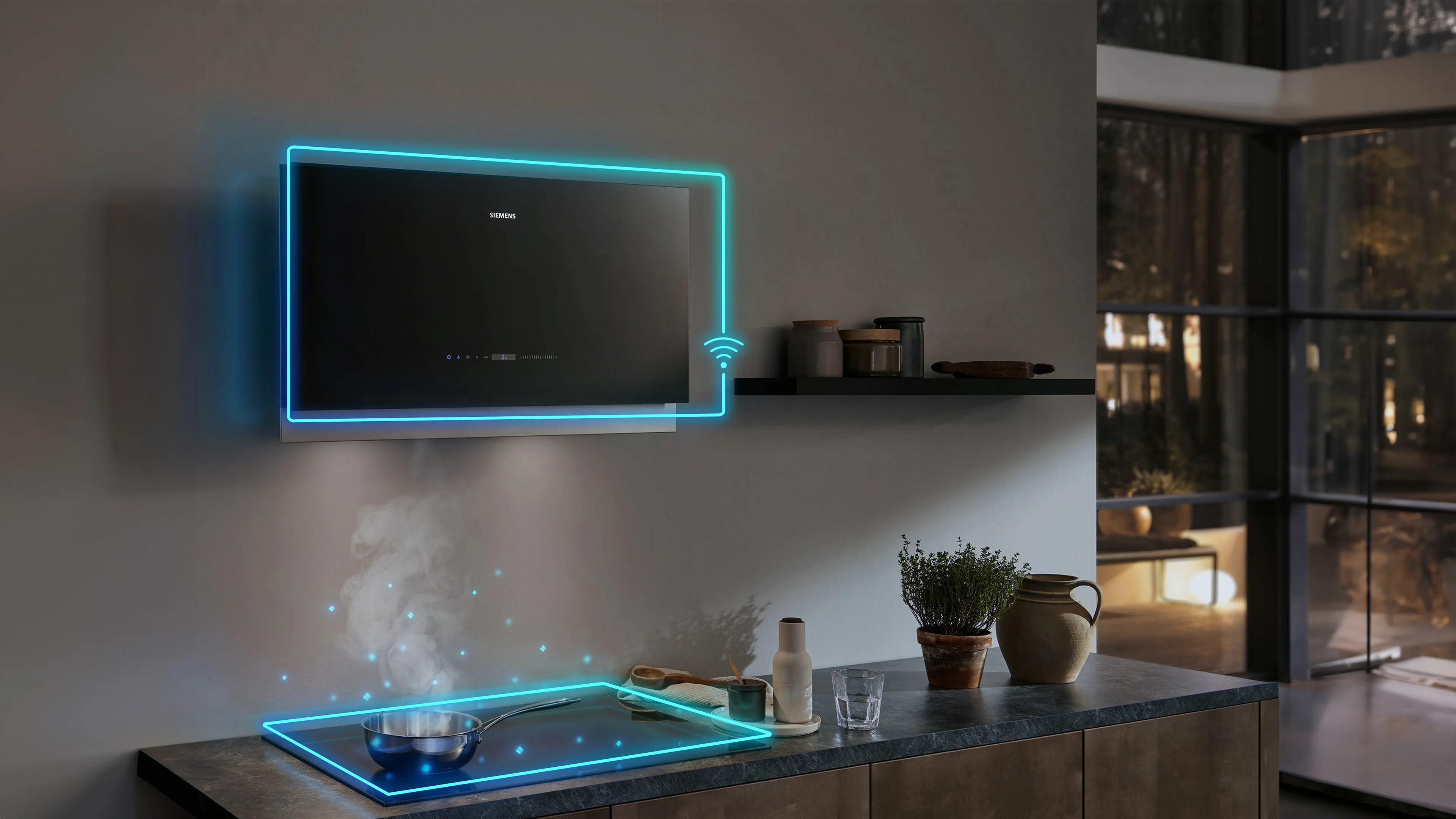 Modern kitchen with sleek black countertop, neon-lit wall-mounted TV, and decorative plants.