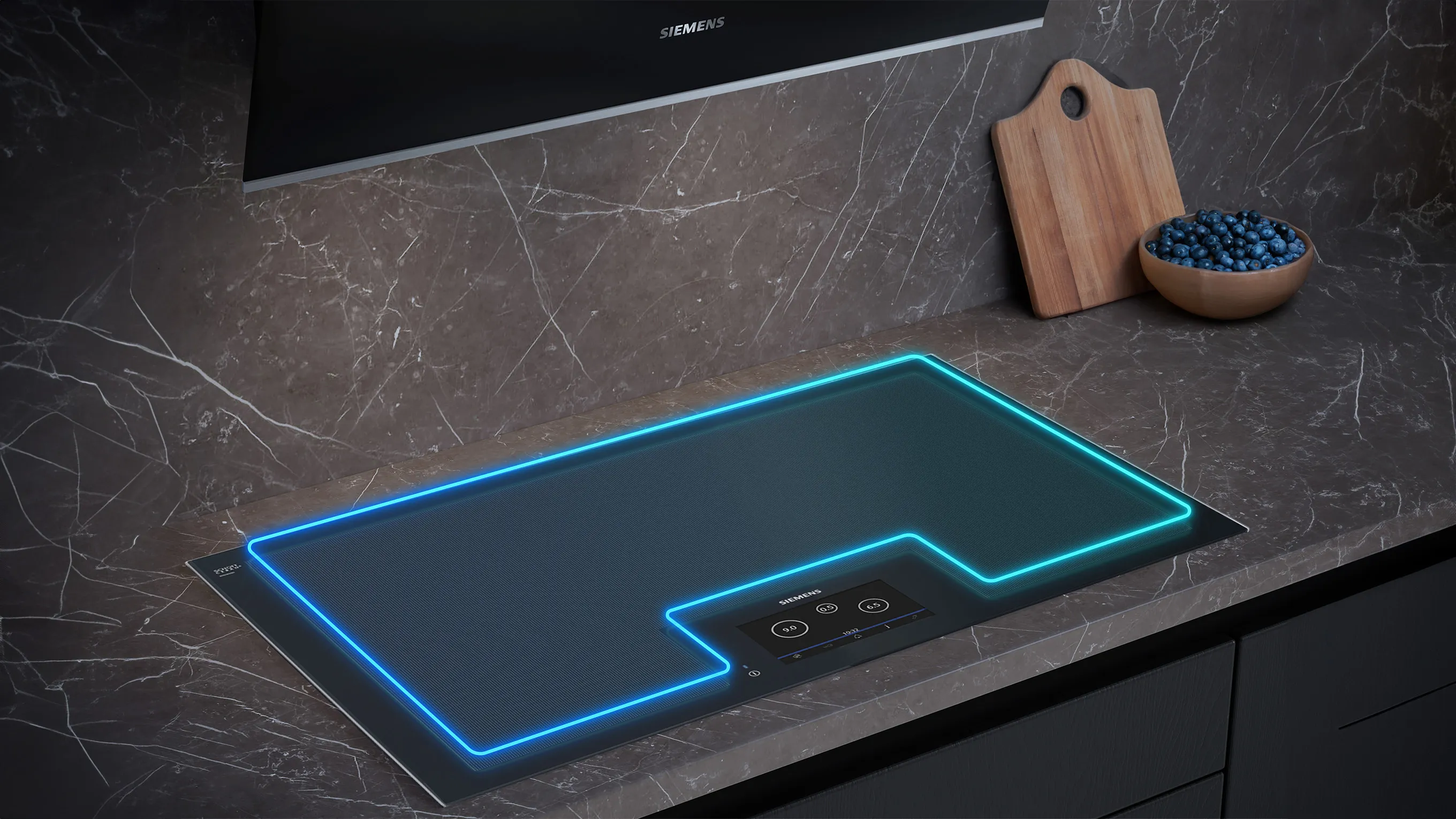 Induction hob with neon overlay highlight cooking zone