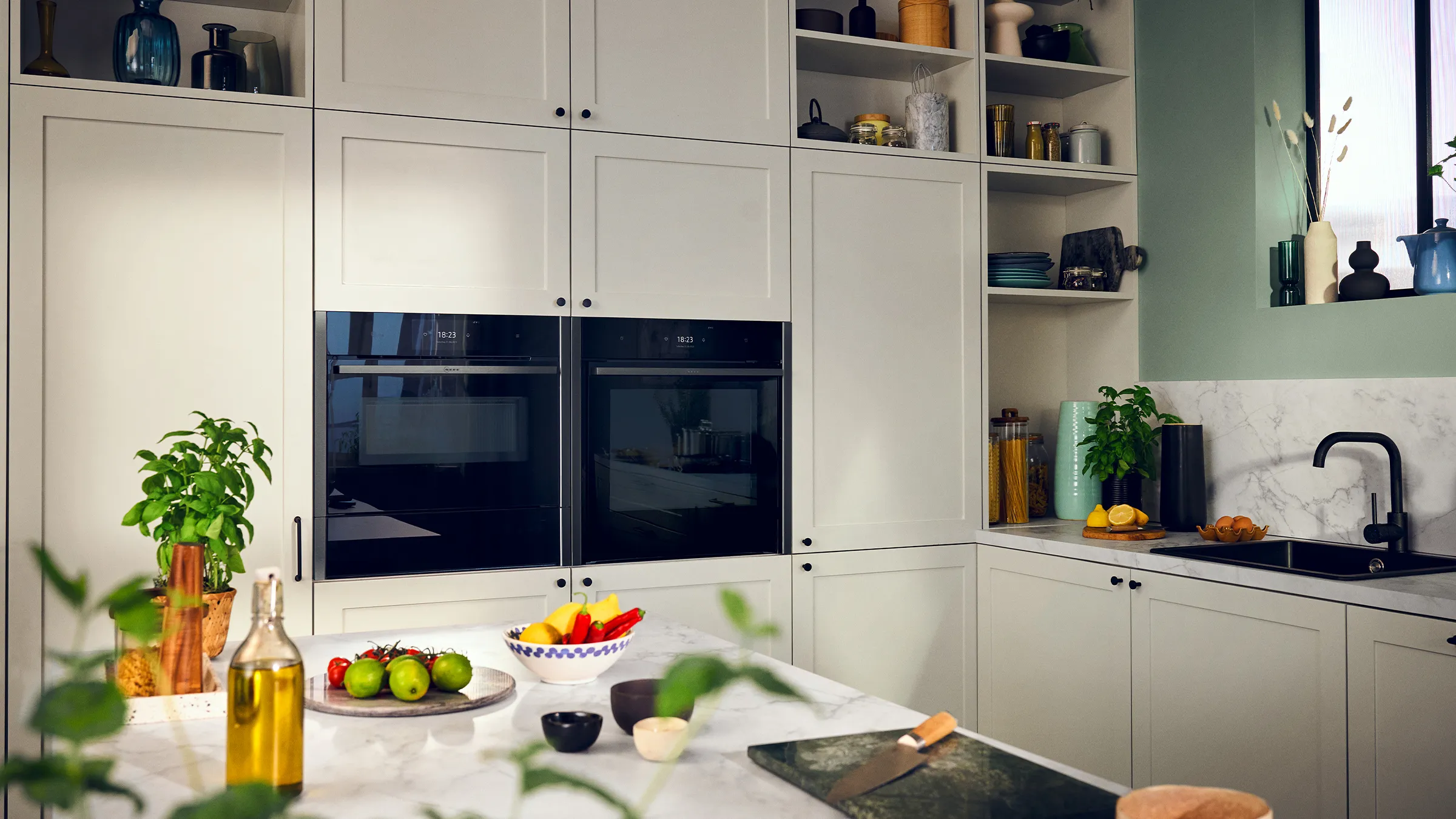 Neff kitchen with appliances in white cabinetry