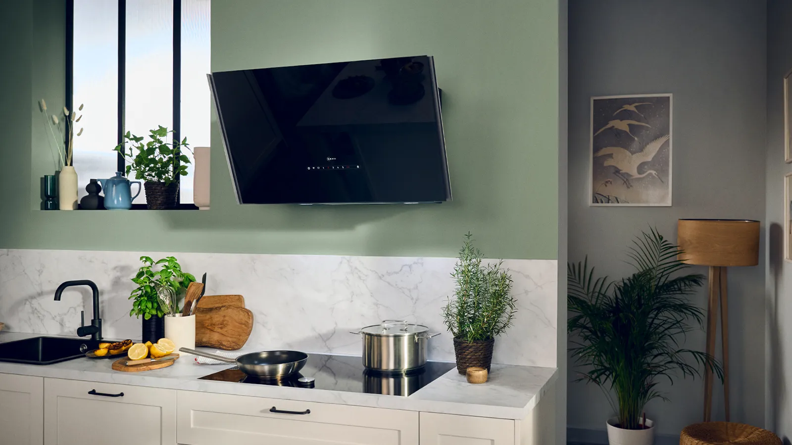 Neff kitchen with wall mounted hoods