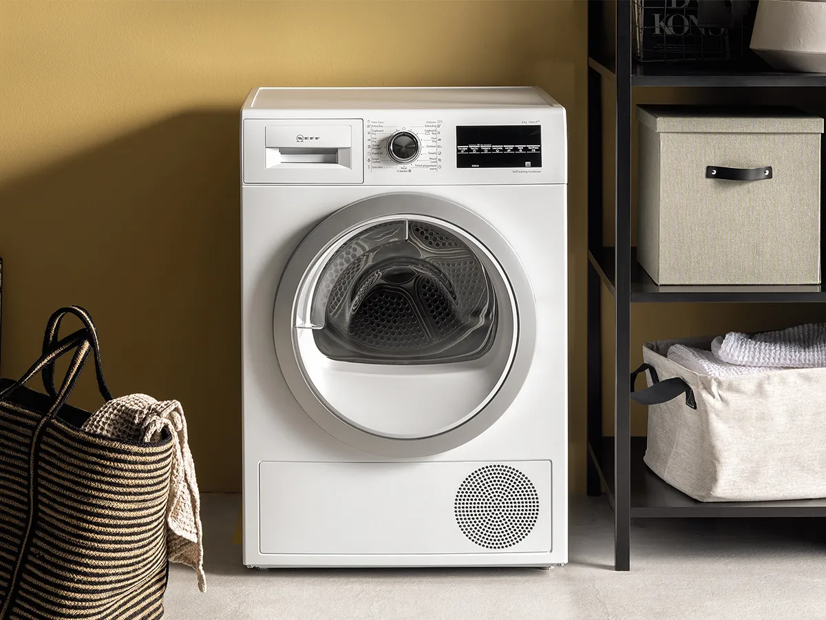 Freestanding washing machine in utility room