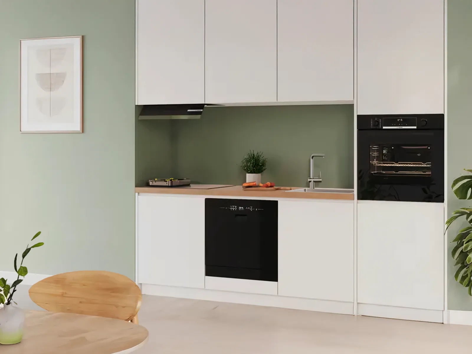 Svart kompakt diskmaskin inbyggd under bänkskivan.