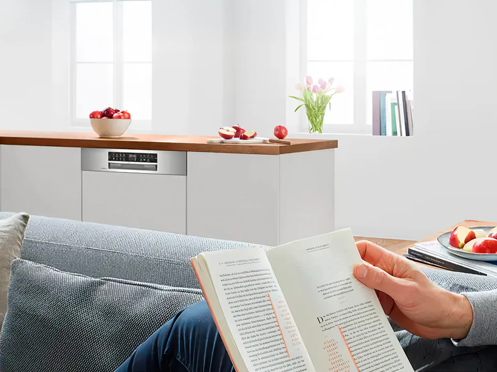 Bosch quiet dishwasher running in the background, allowing to enjoy everyday moments like reading without any disturbance.
