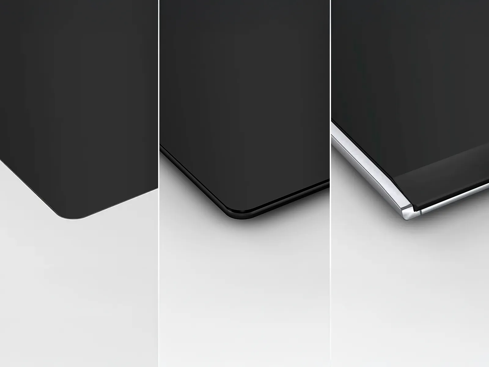 Three close-up views of the sleek black bezels, showing different designs: rounded, angled and a polished metallic finish. 