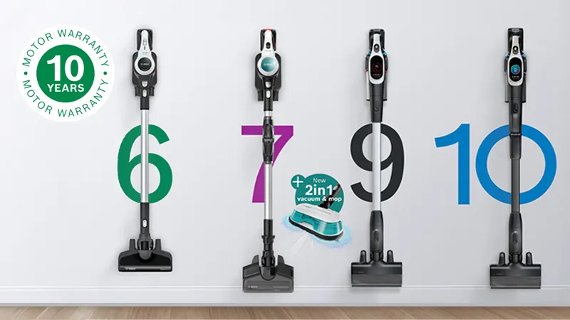 Full range of Unlimited vacuums mounted against a white wall