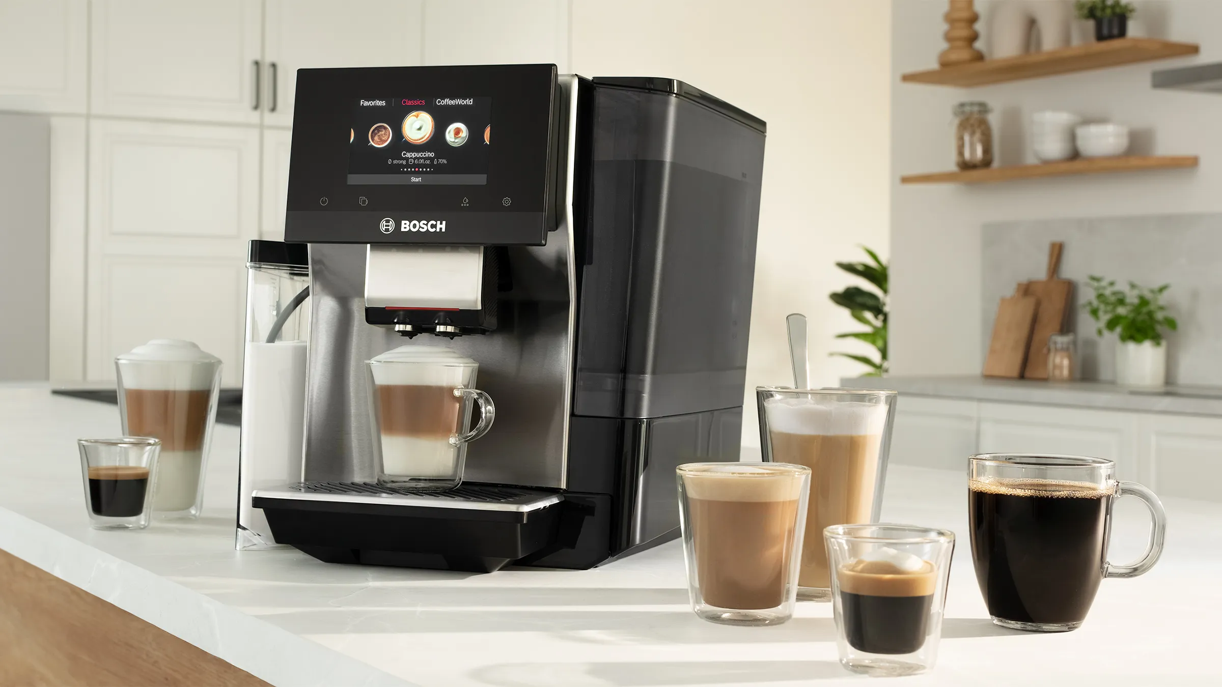 Coffee machine on a kitchen counter with full coffee mugs