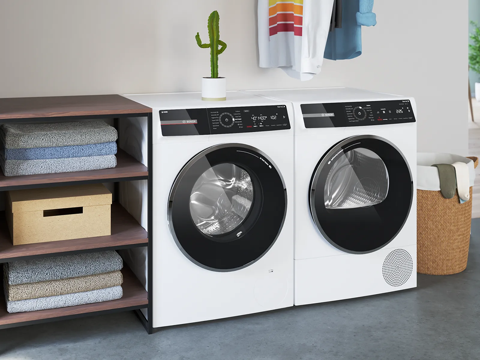 Folded same colour towels as the energy label stacked on top of a washer dryer.