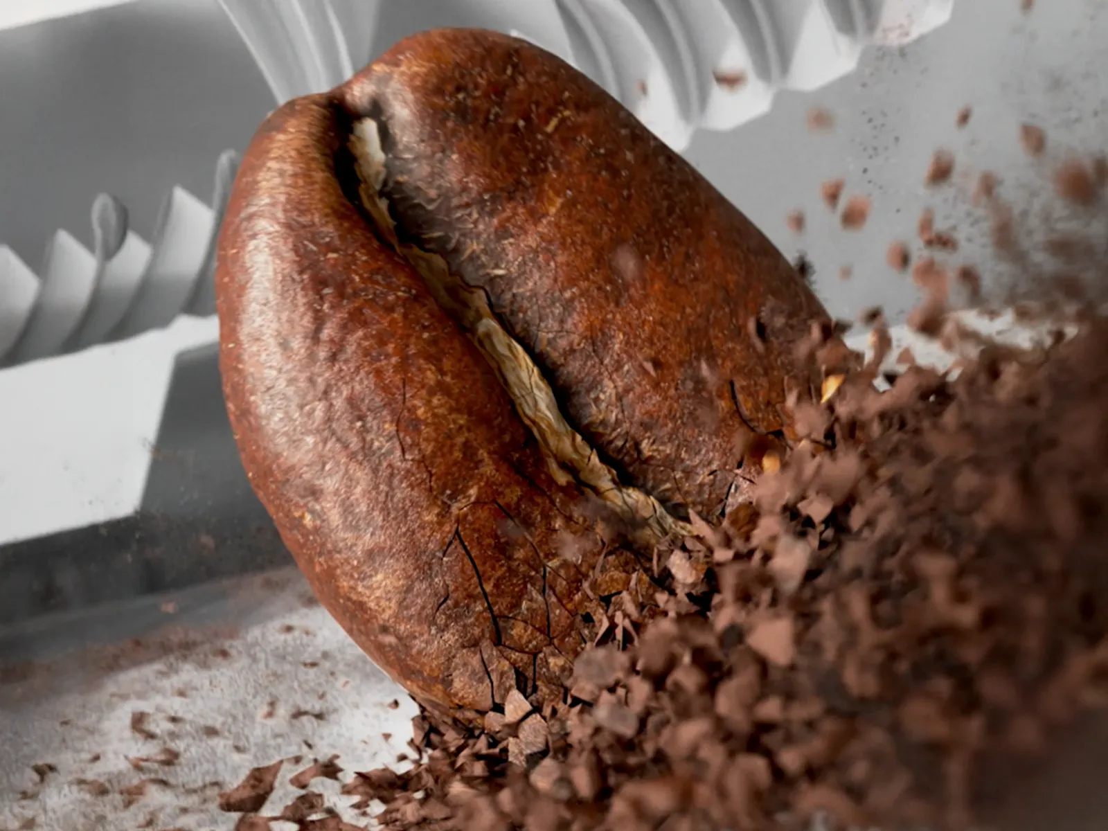 Close-up of coffee bean being ground.