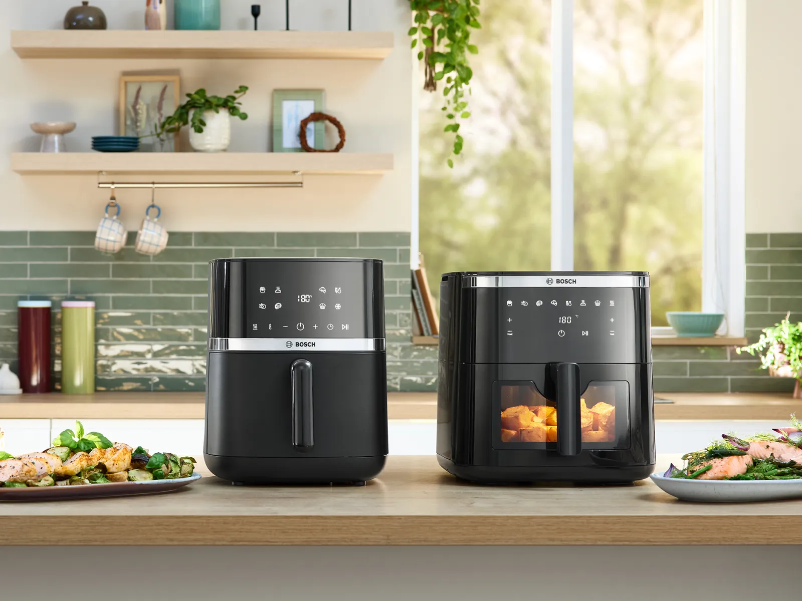 Bosh air fryers on countertop in a bright kitchen
