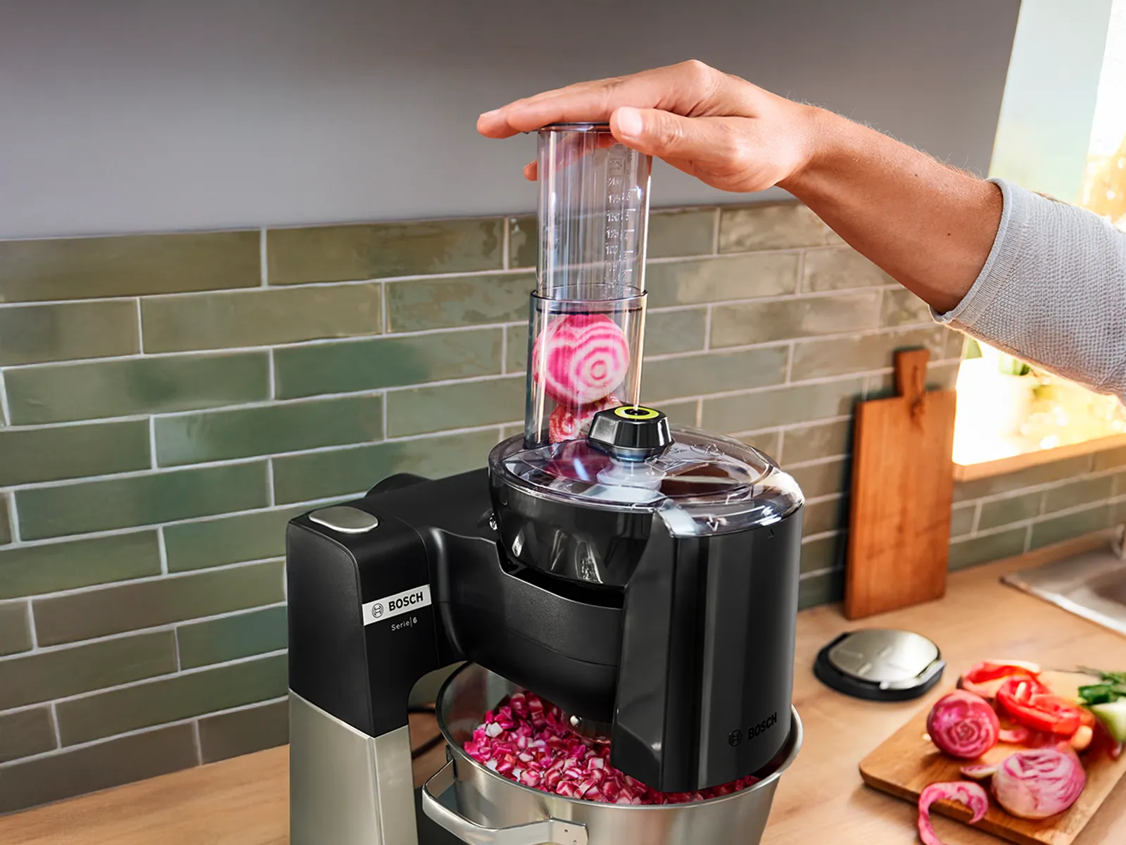 Series 6 with Cube Cutter accessory cutting cucumber cubes.