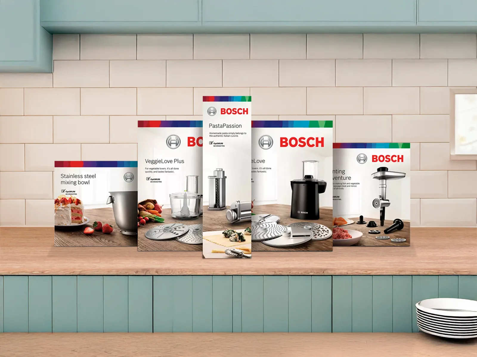 A lineup of Bosch stand mixer attachment boxed sets.