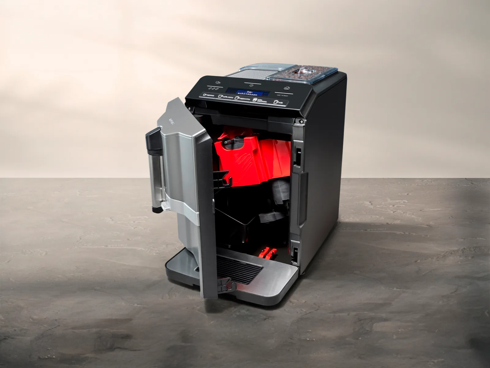 Frontlåge på den fuldautomatiske espresso-/kaffemaskine EQ300 er åben, maskinens indre og bryggeenhed er synligt.