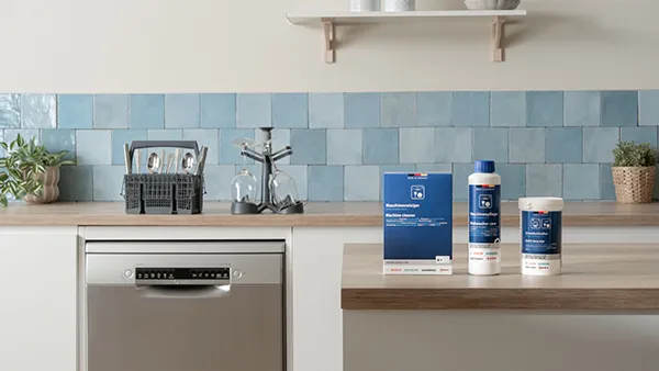 Cleaning accessories and spare parts presented on kitchen countertop