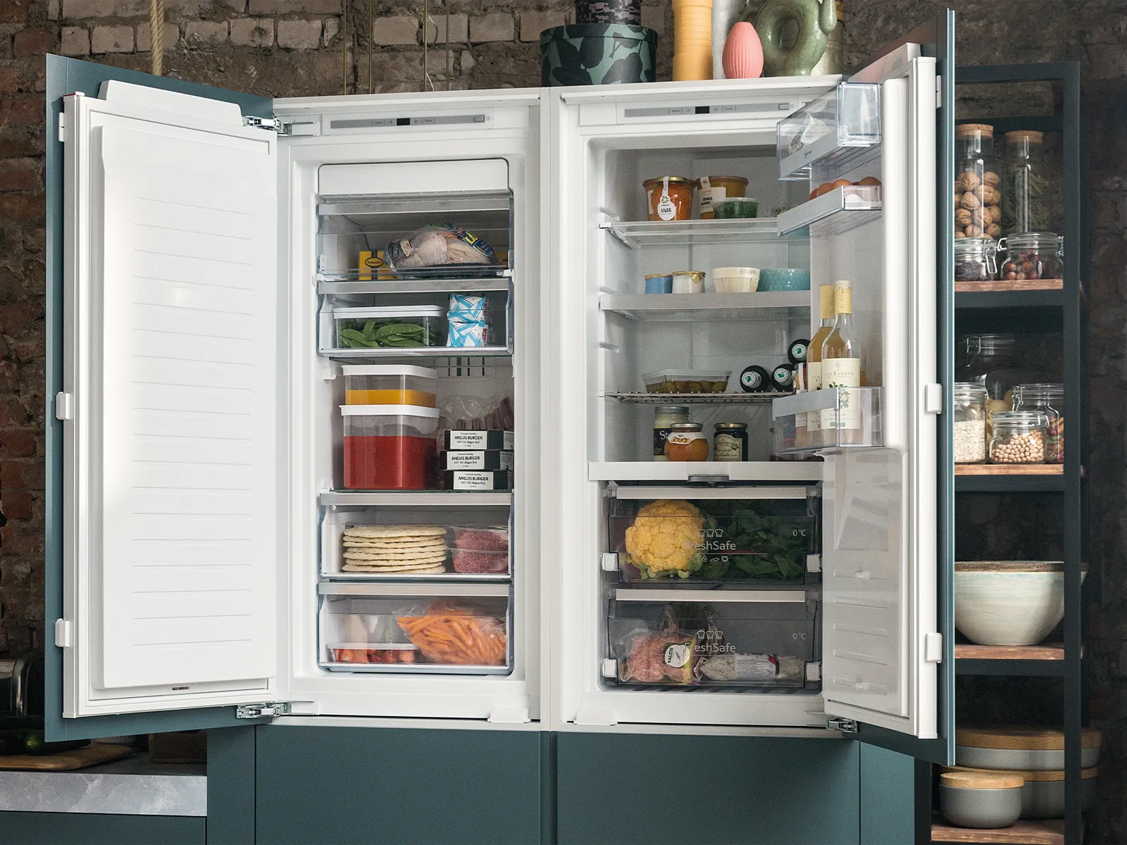 An open side-by-side unit with the freezer on the left.