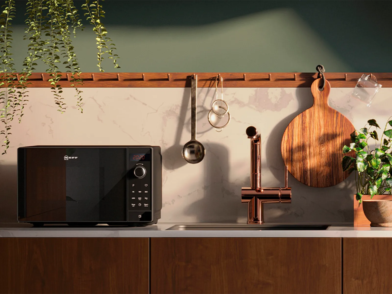 Vapaasti sijoitettava NEFF-mikroaaltouuni vaalealla keittiötasolla.