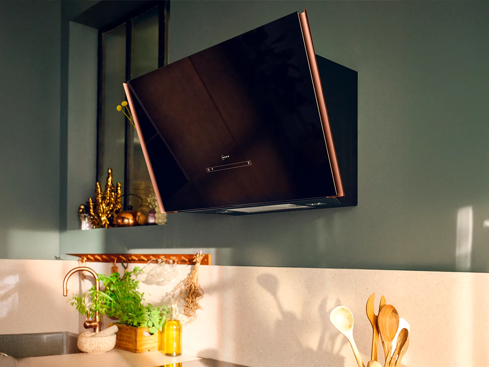 Inclined hood with Brushed Bronze side strips