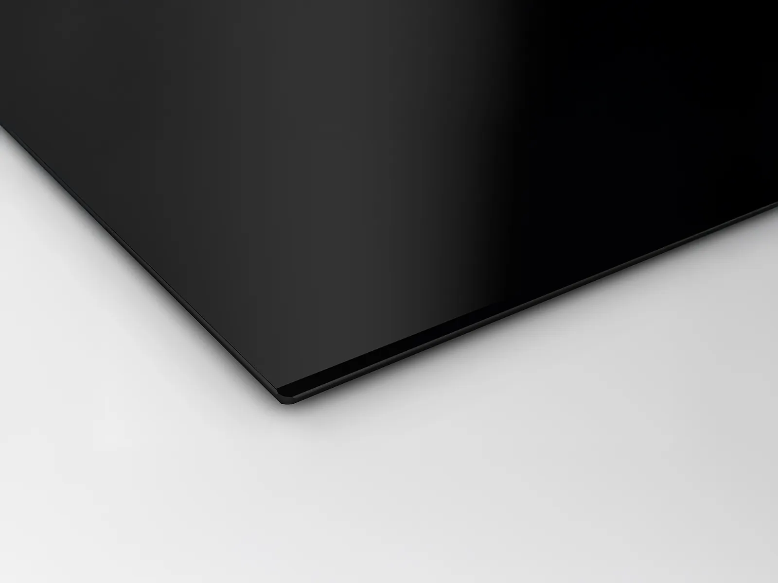 Corner shot of Flex Design cooktop with Brushed Bronze side trim