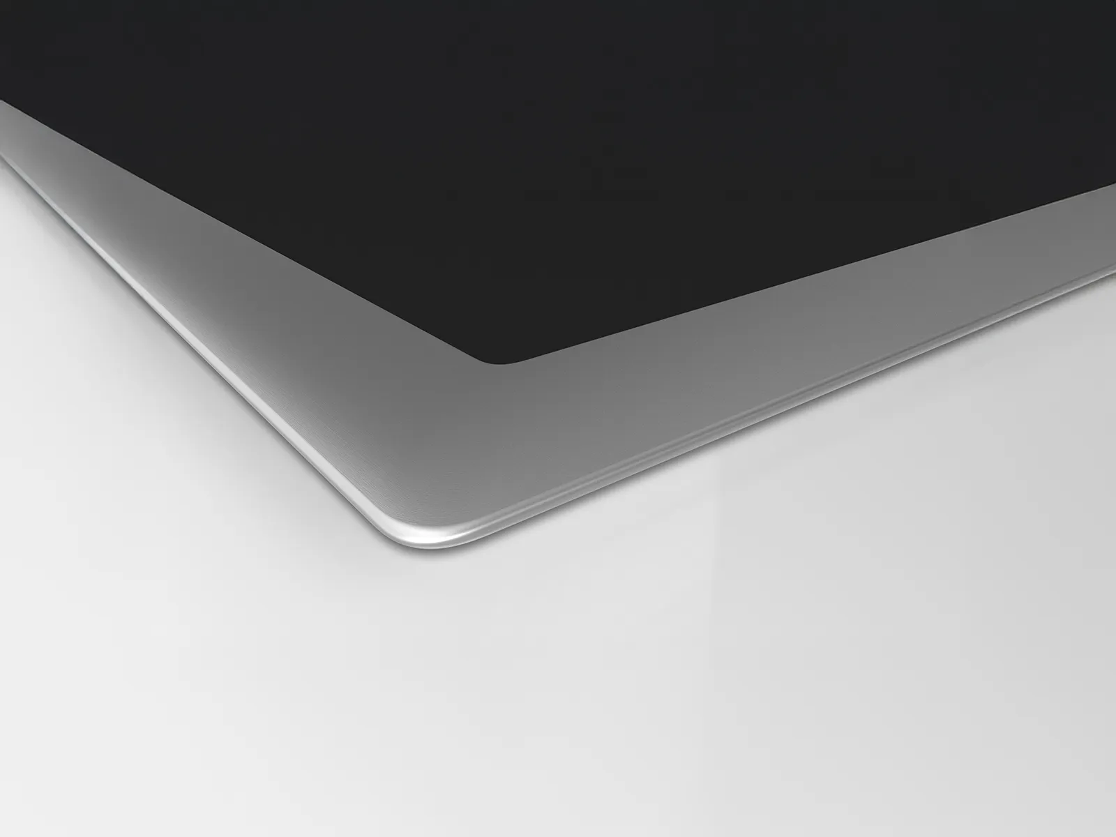 Corner shot of cooktop with stainless steel trim