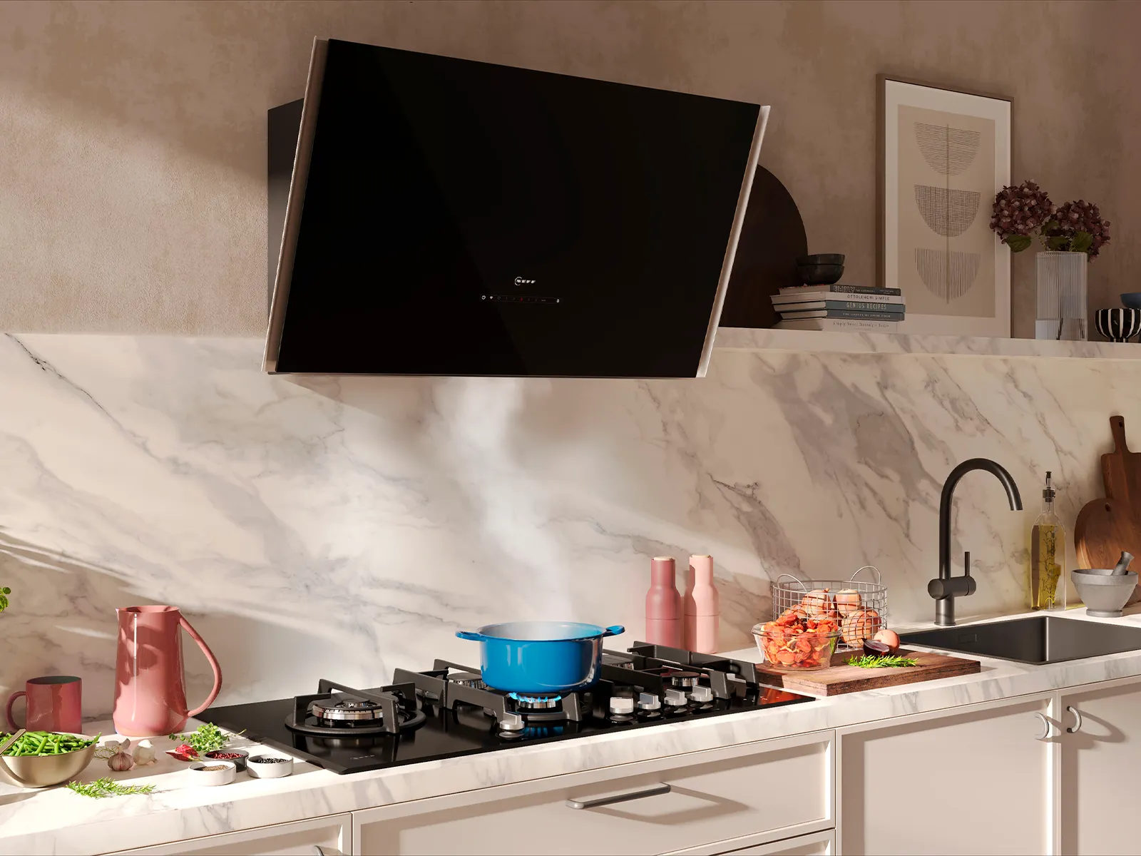 A modern kitchen with a gas hob and an elegant black hood.