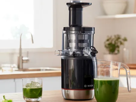 The Bosch slow juicer VitaExtract standing on a kitchen worktop.