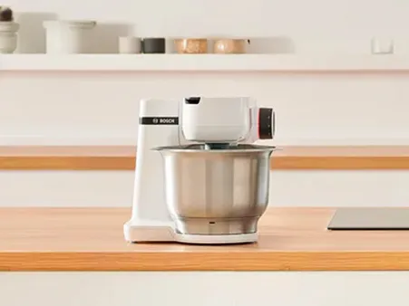 A front shot of a white Series 2 MUM stand mixer.