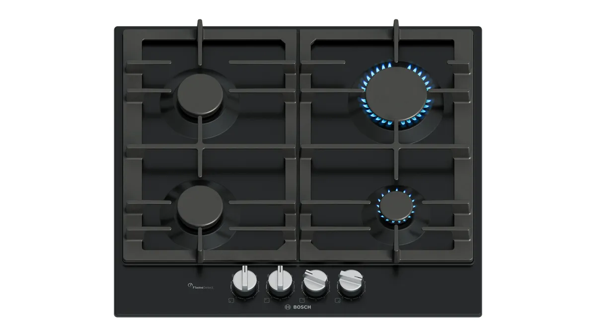 A Bosch gas cooktop featuring four burners, including two with blue flame indicators.