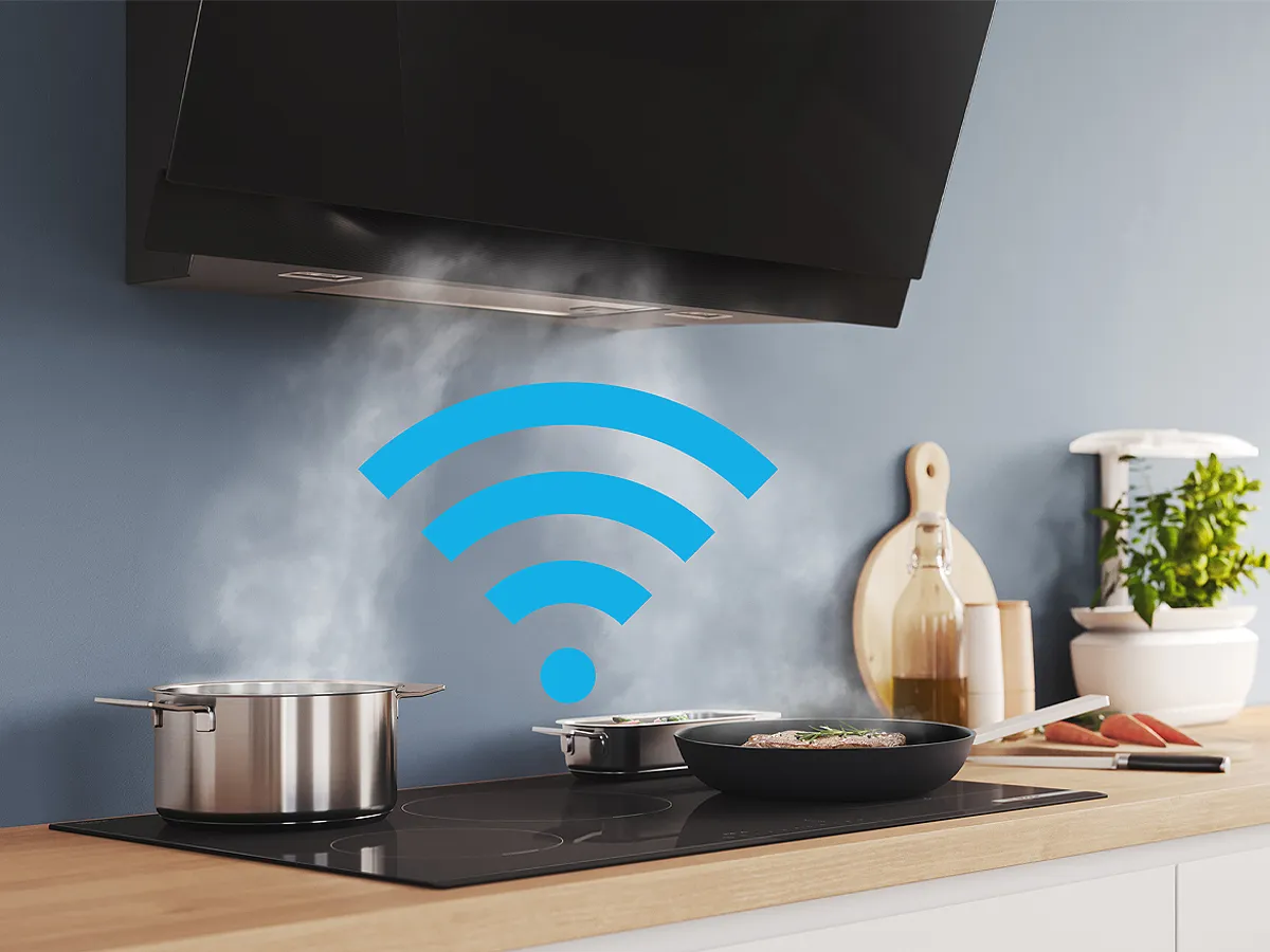 Wall mounted hood extracting steam with Wi-Fi icon overlay