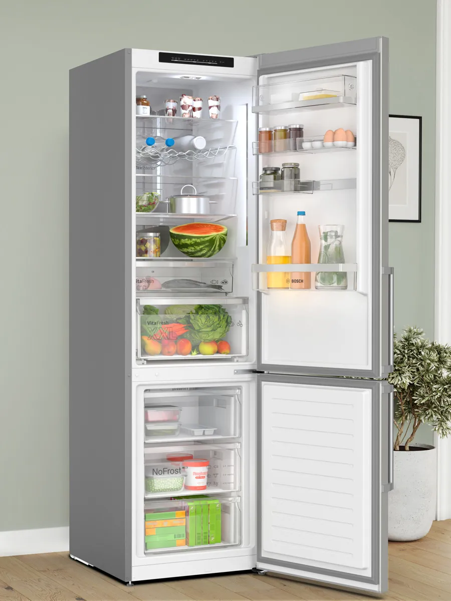 Stainless steel refrigerator with two doors, digital display, and modern design.