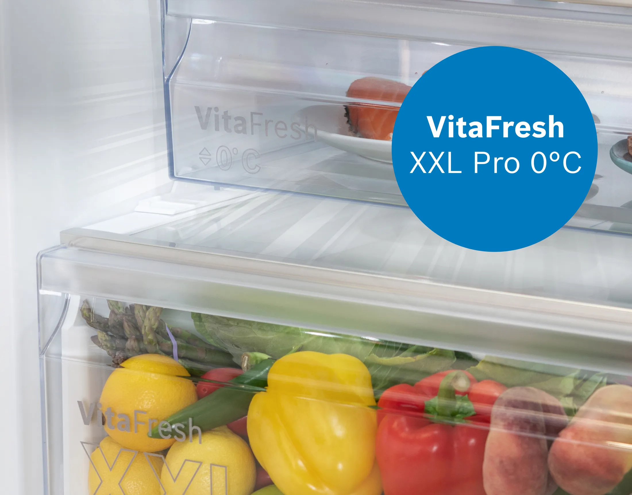 A well-organized refrigerator filled with fresh food, drinks, and condiments in storage containers.