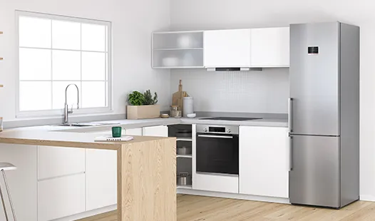 Fridge freezer in Scandinavian style kitchen