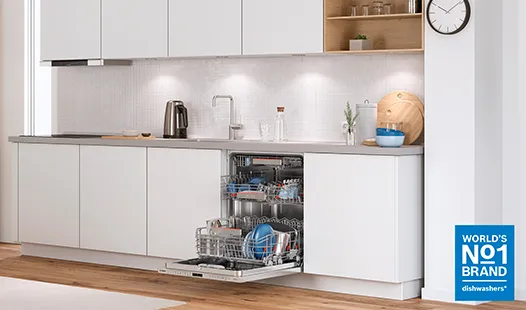 Kitchen with baby highchair and open dishwasher