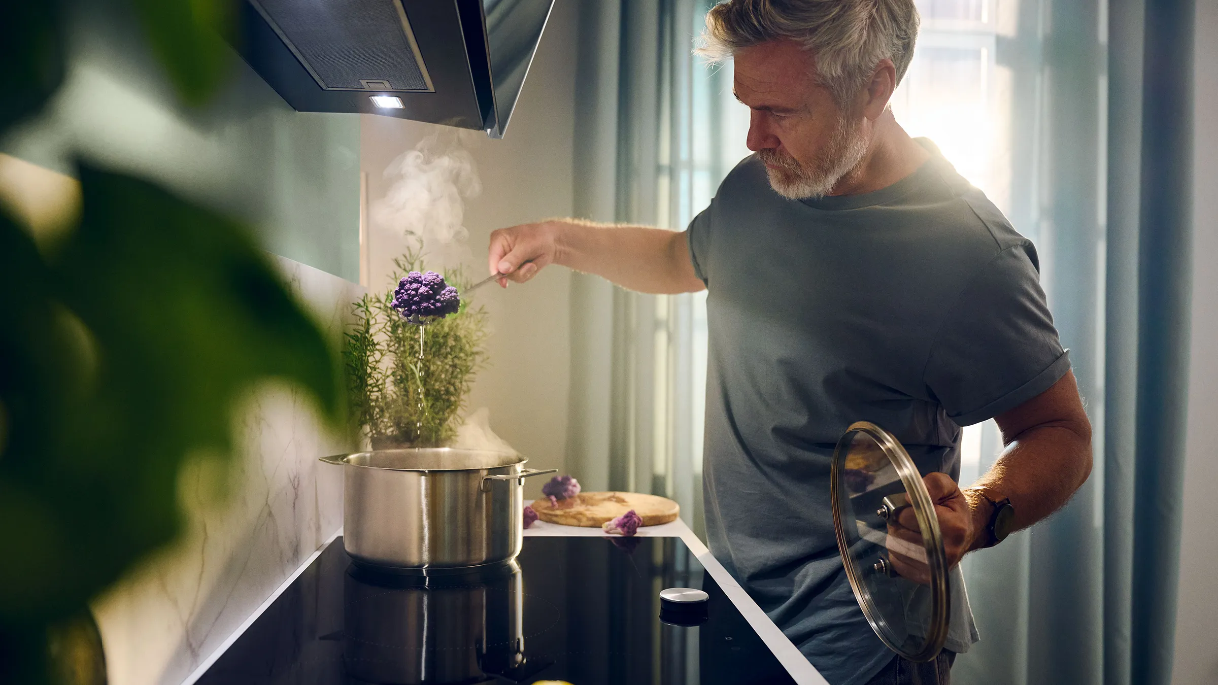 Man cooking over a pan