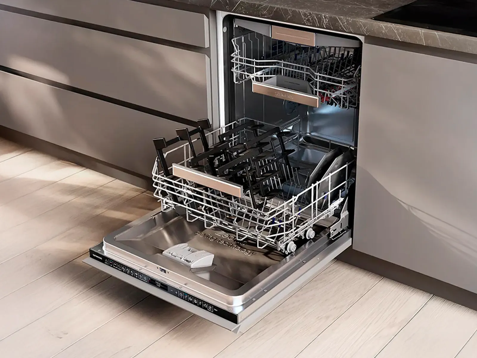 An open Siemens dishwasher with the gas hob pan supports loaded into the bottom rack.