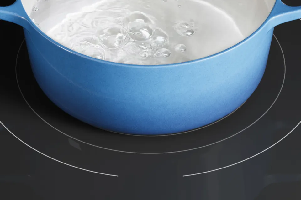 Thermador masterpiece induction cooktop with red pot