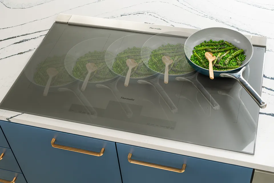 Thermador Masterpiece Collection liberty Induction Cooktop with pan moving