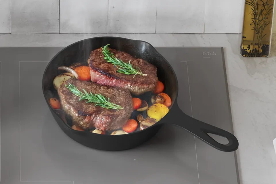 Thermador Masterpiece Collection liberty Induction Cooktop with salmon in pan
