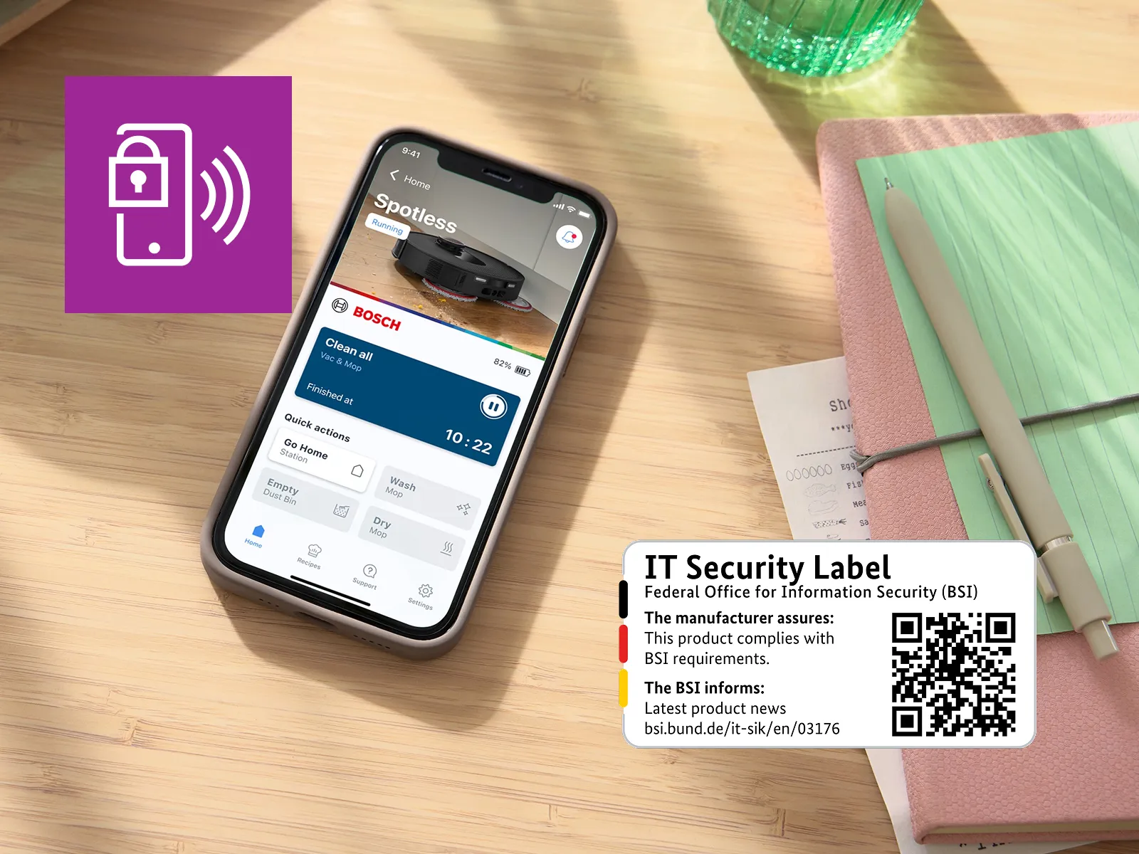 Smartphone på nattduksbordet visar Spotless profilsida i Bosch Home Connect-appen.