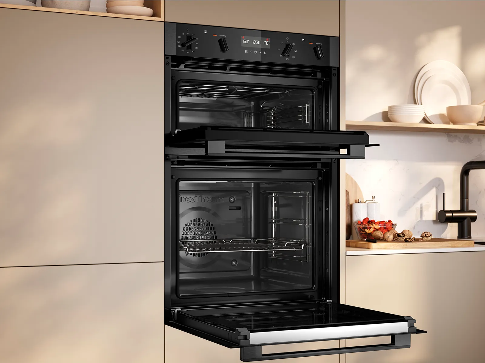 A double oven built into a kitchen cabinet, featuring two open doors, a digital control panel, and a minimalist design.