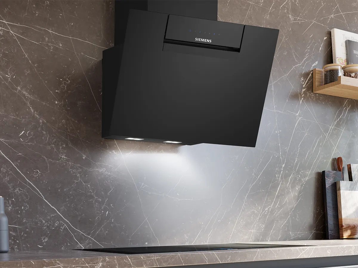 Angled cooker hood against dark wall