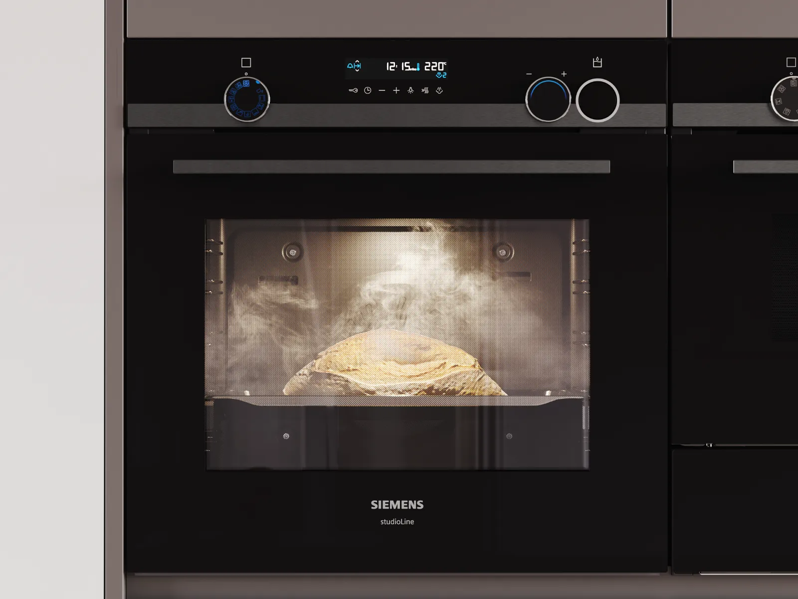 En Siemens dampovn med glasdør og digitale kontroller bager et brød