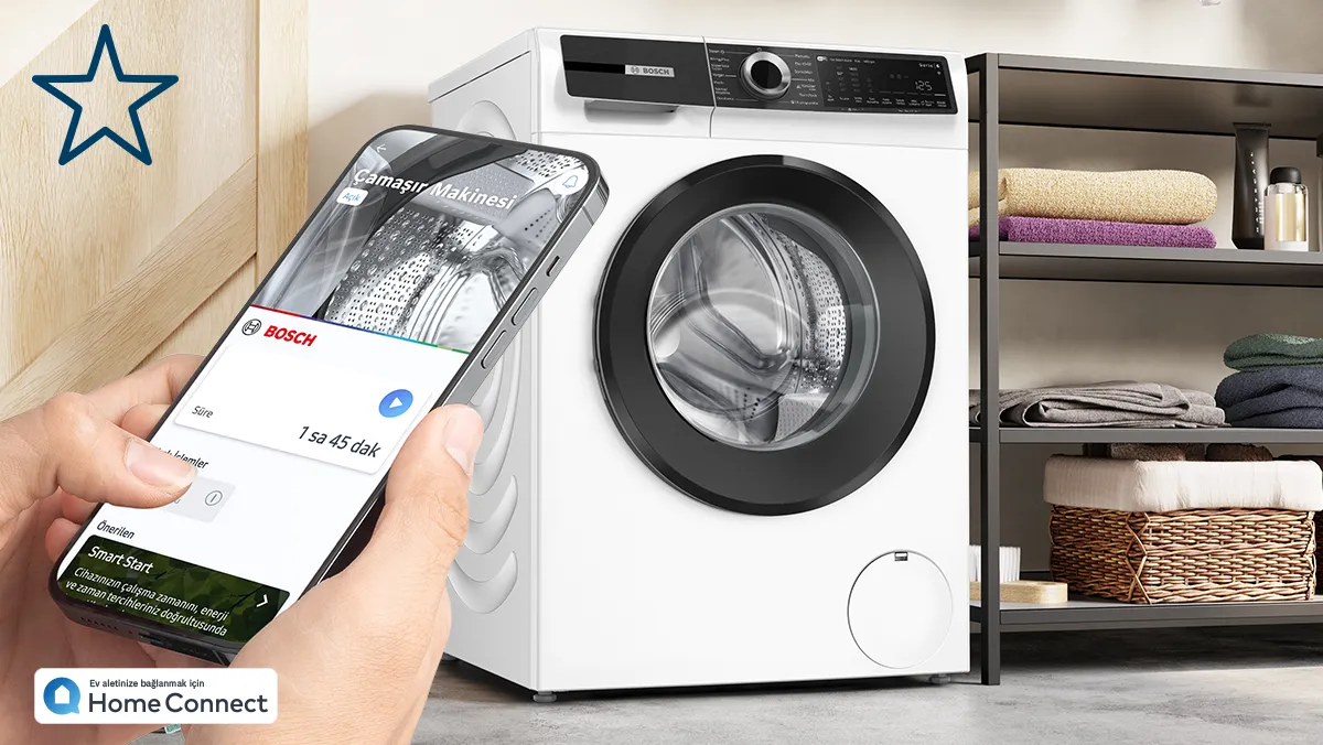 Home Connect uygulamasıyla kontrol edilen beyaz Bosch çamaşır makinesi.