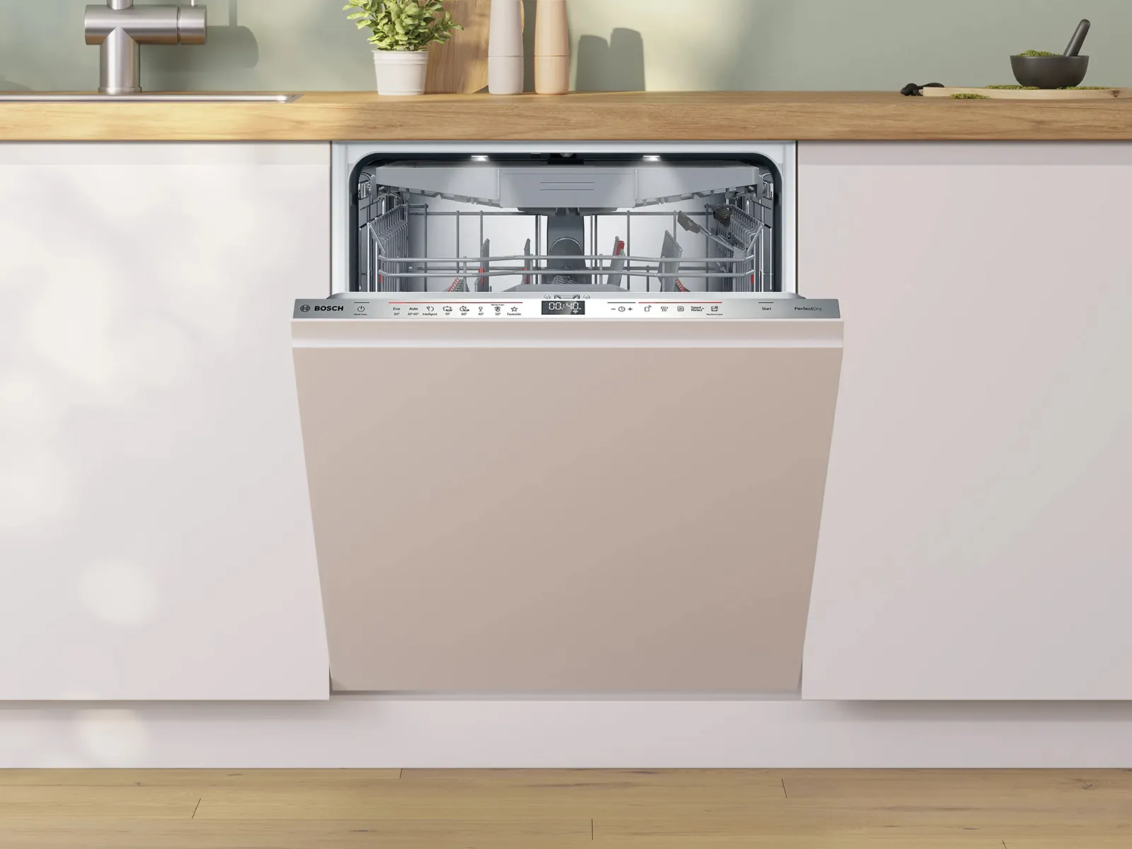 Modern kitchen with an open dishwasher seamlessly integrated into white cabinetry. A custom solution for any kitchen design.