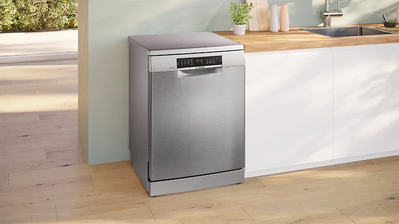 Freestanding dishwasher with a stainless steel finish, designed to blend stylishly and fit flexibly in any kitchen space.