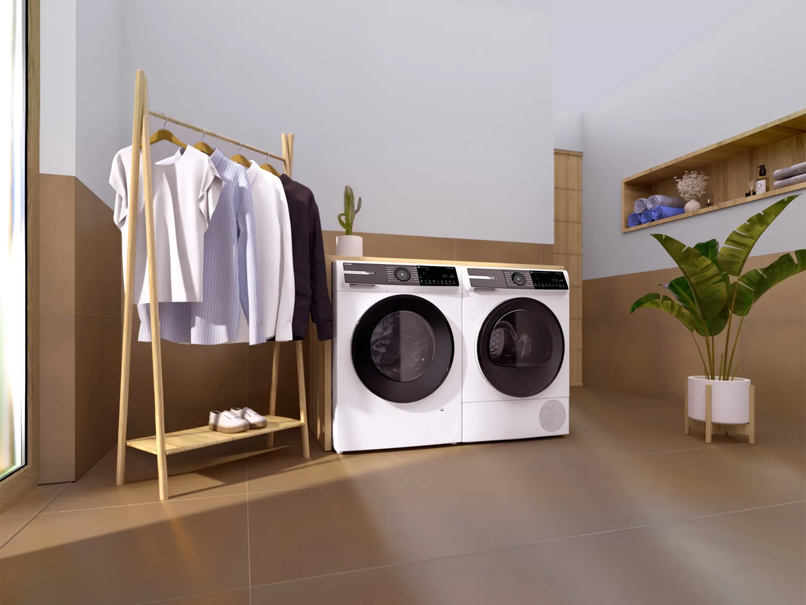 Ein Waschraum mit einem Kleiderständer mit hängenden Hemden und einem weißen Waschmaschine und Trockner.