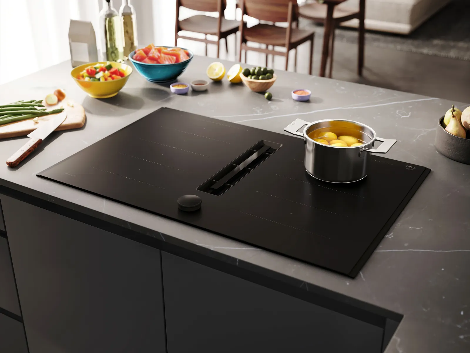 Neff matt black hob on kitchen countertop with various kitchen utensils