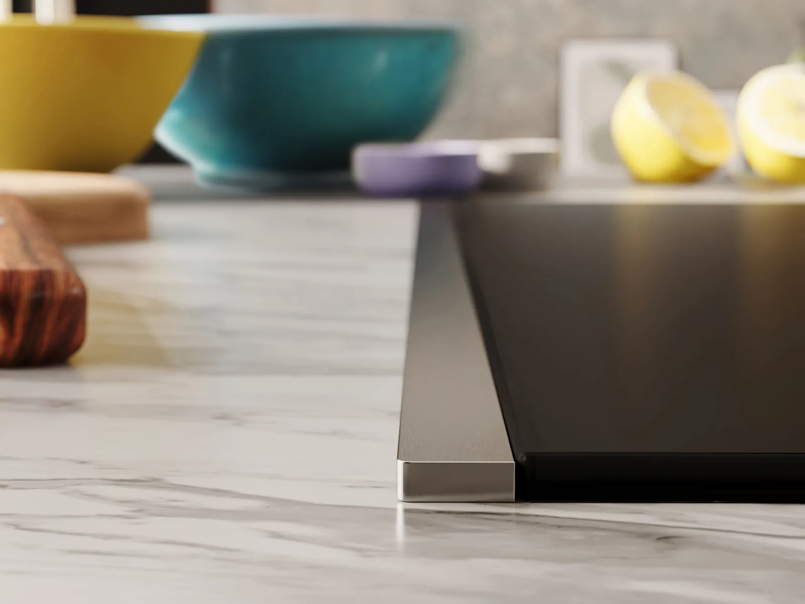 Detailansicht eines NEFF Induktionskochfelds mit Flex Design Seitenleisten in Metallic Silver