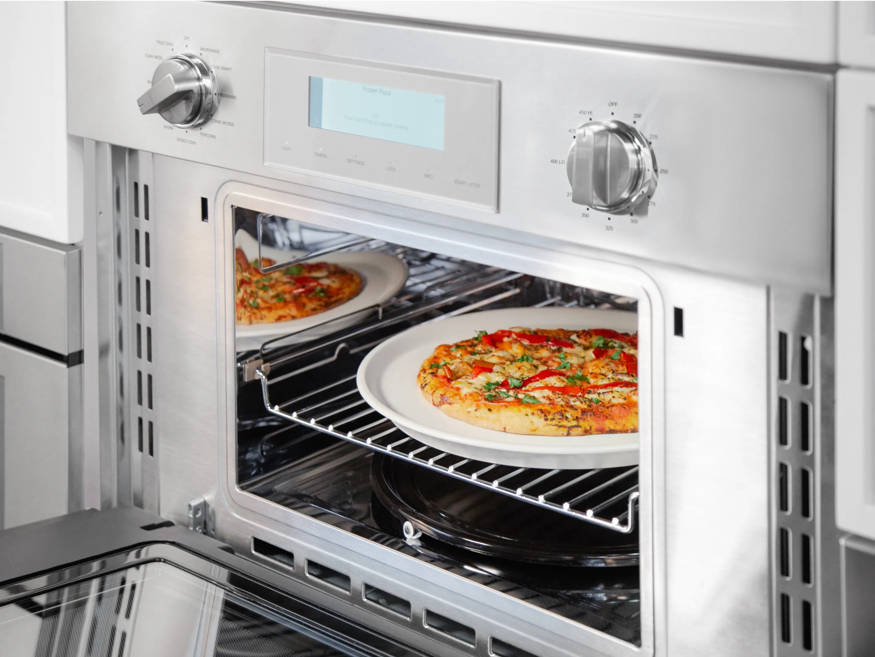 Triple ovens closeup professional speed oven pizza reheat